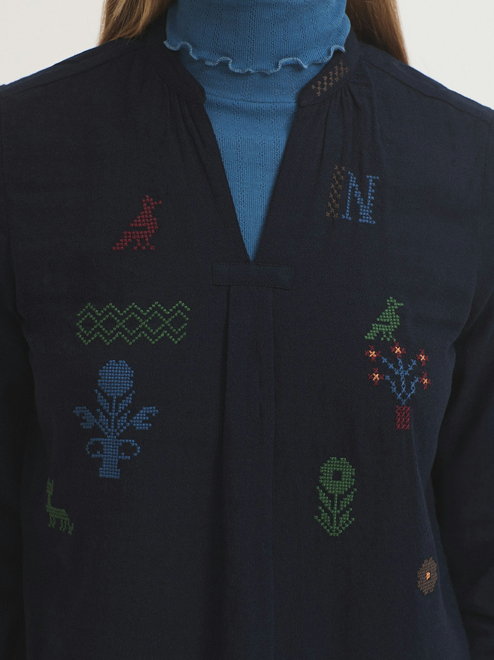 Cross stitch embroidered blouse
