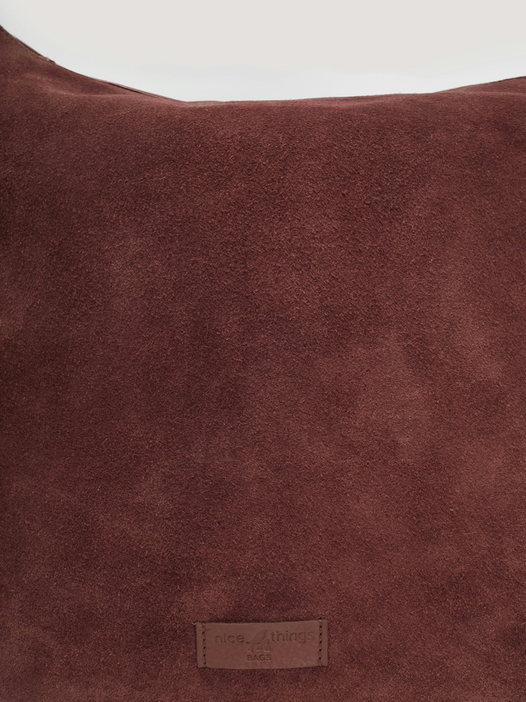 Hobo bag with suede handle