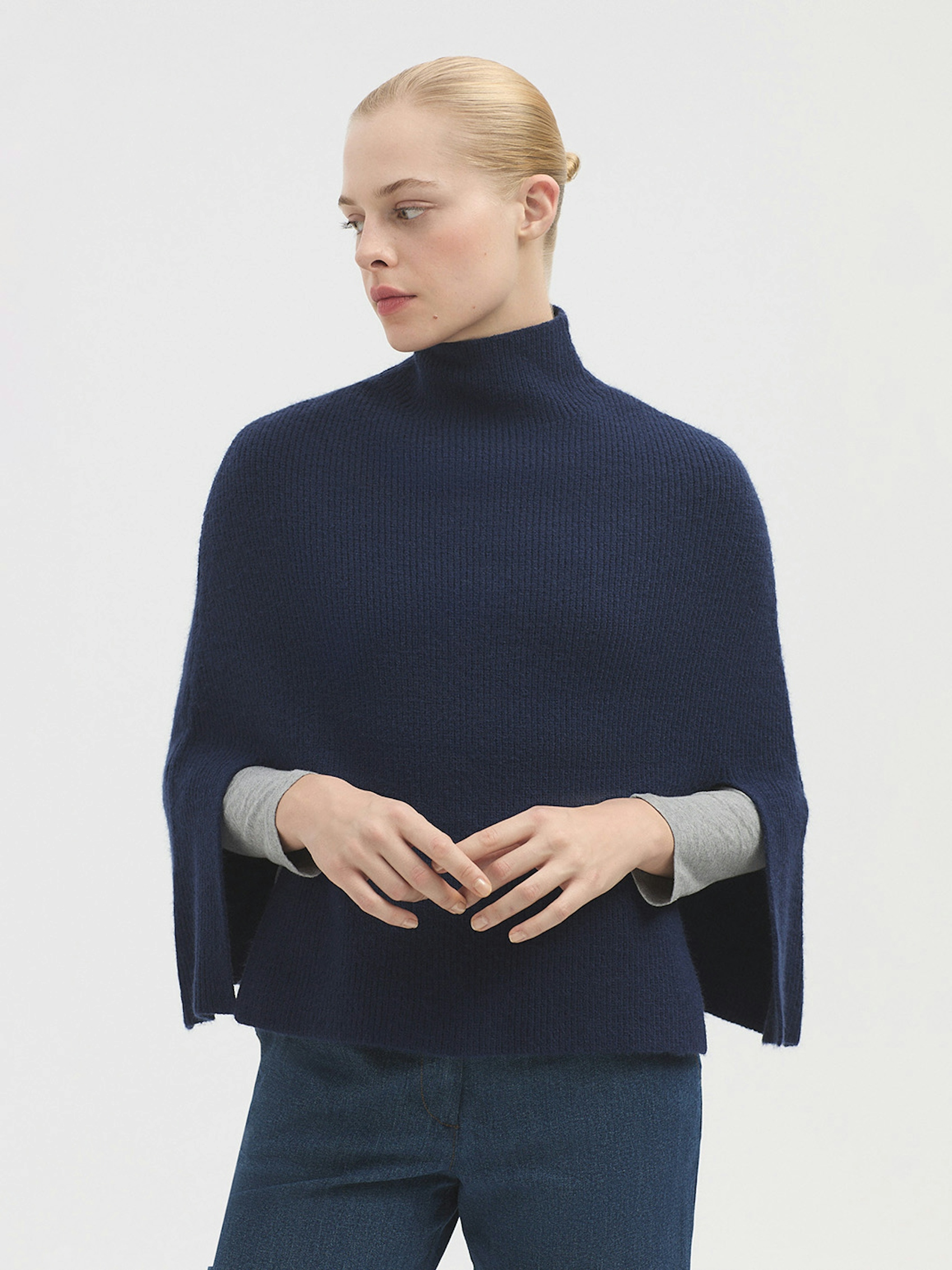 Roll neck cape with splits