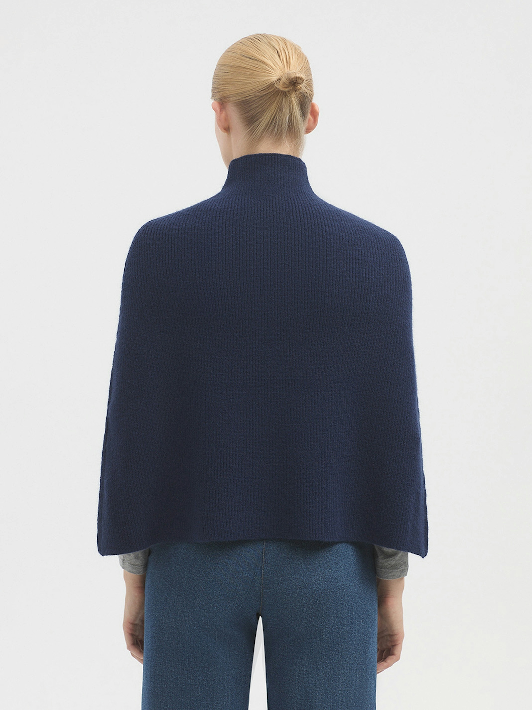 Roll neck cape with splits