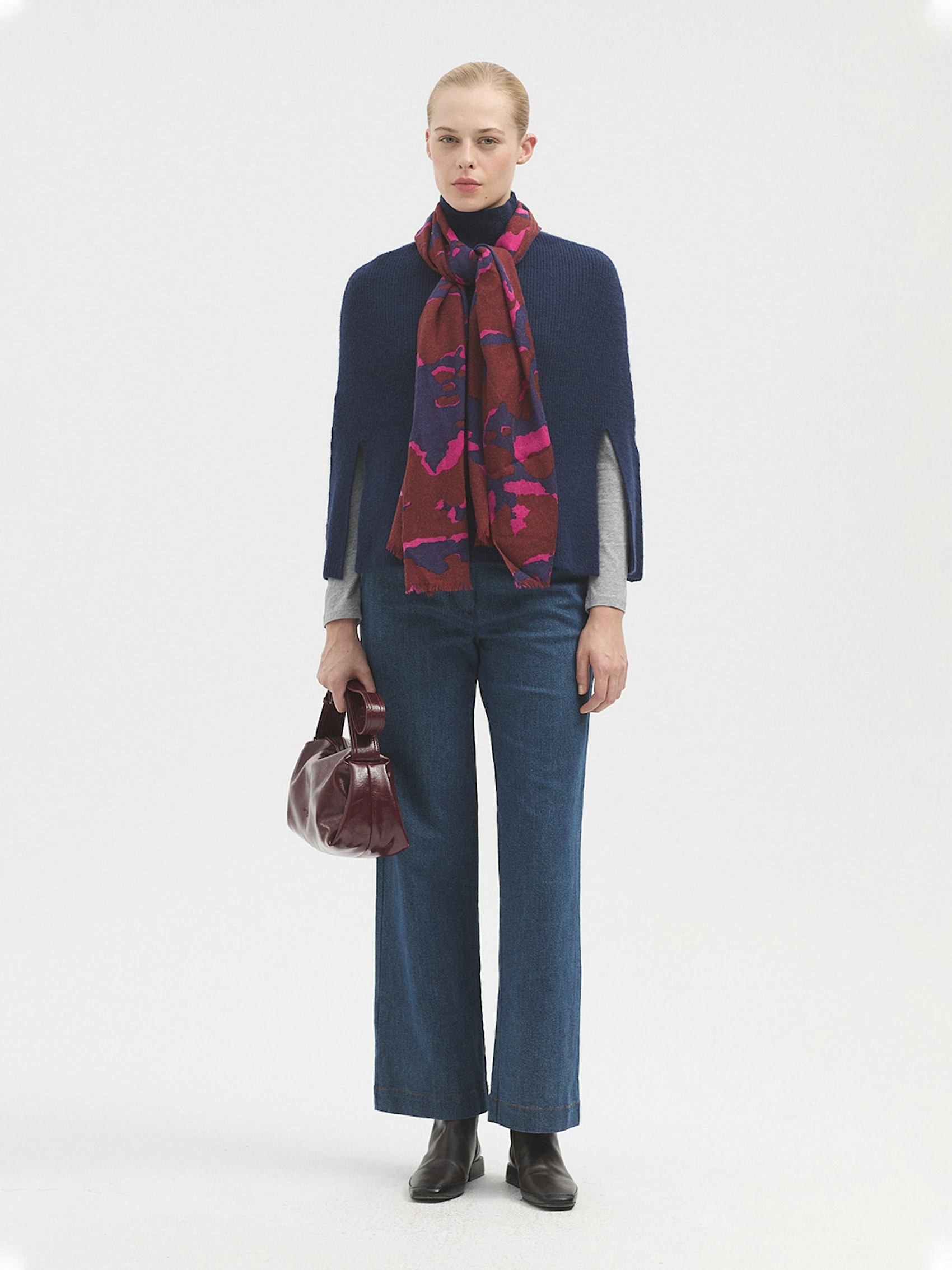 Roll neck cape with splits