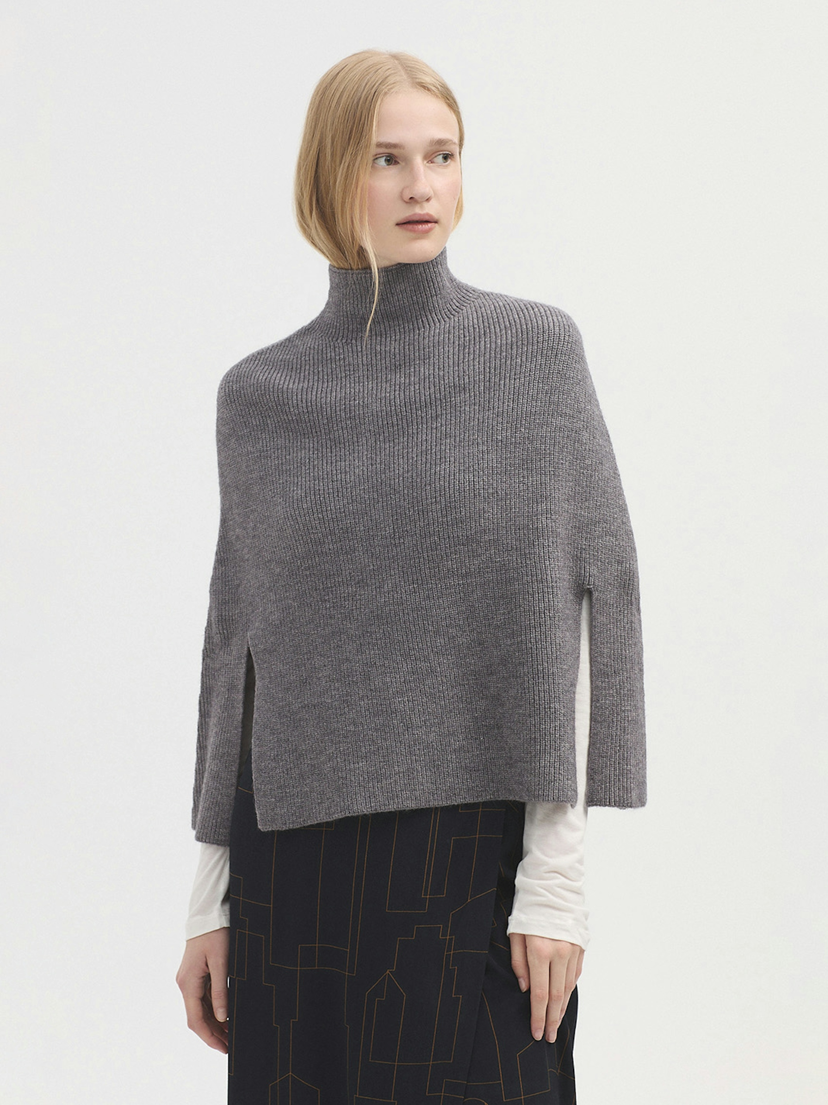 Roll neck cape with splits
