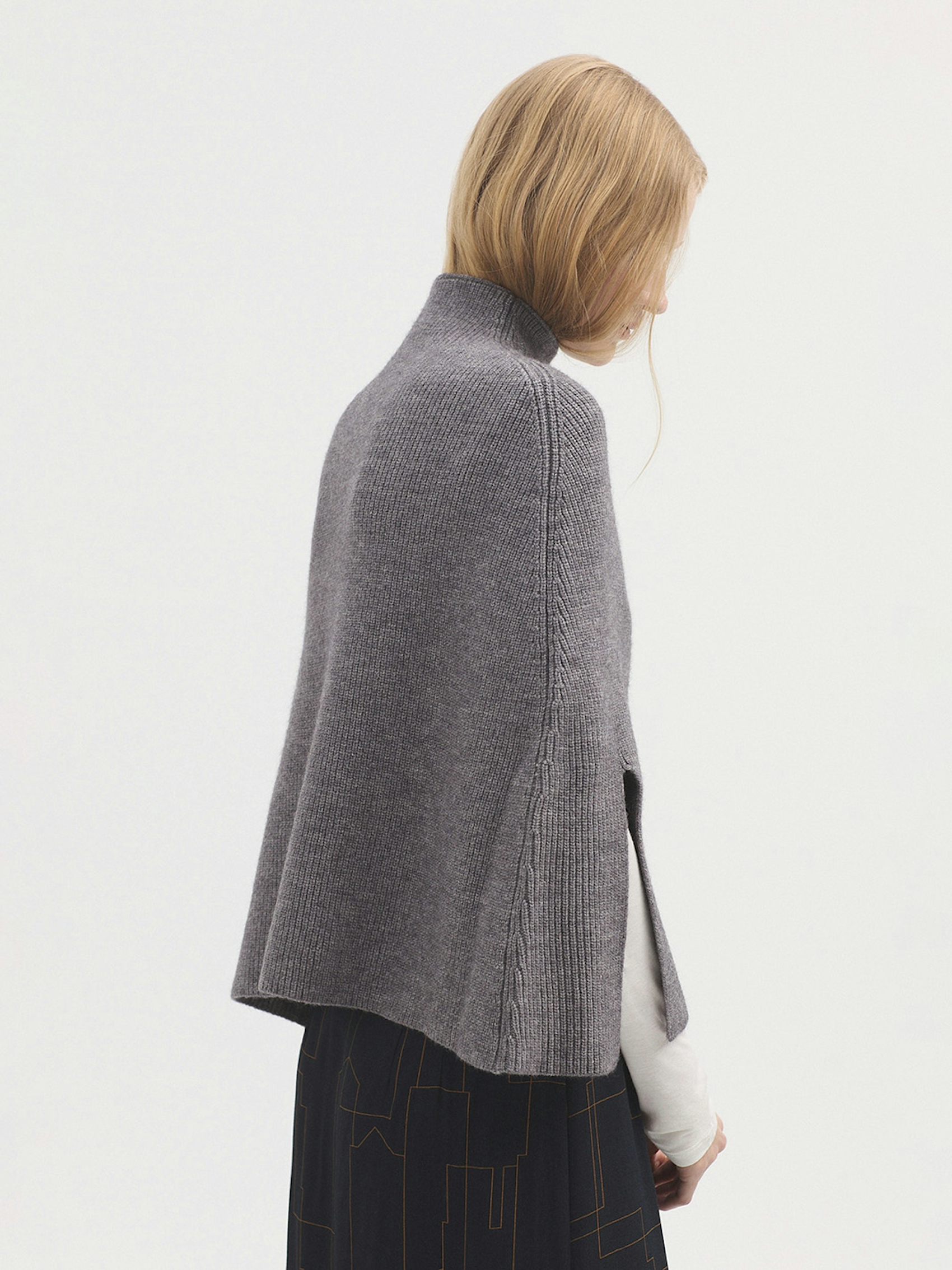 Roll neck cape with splits