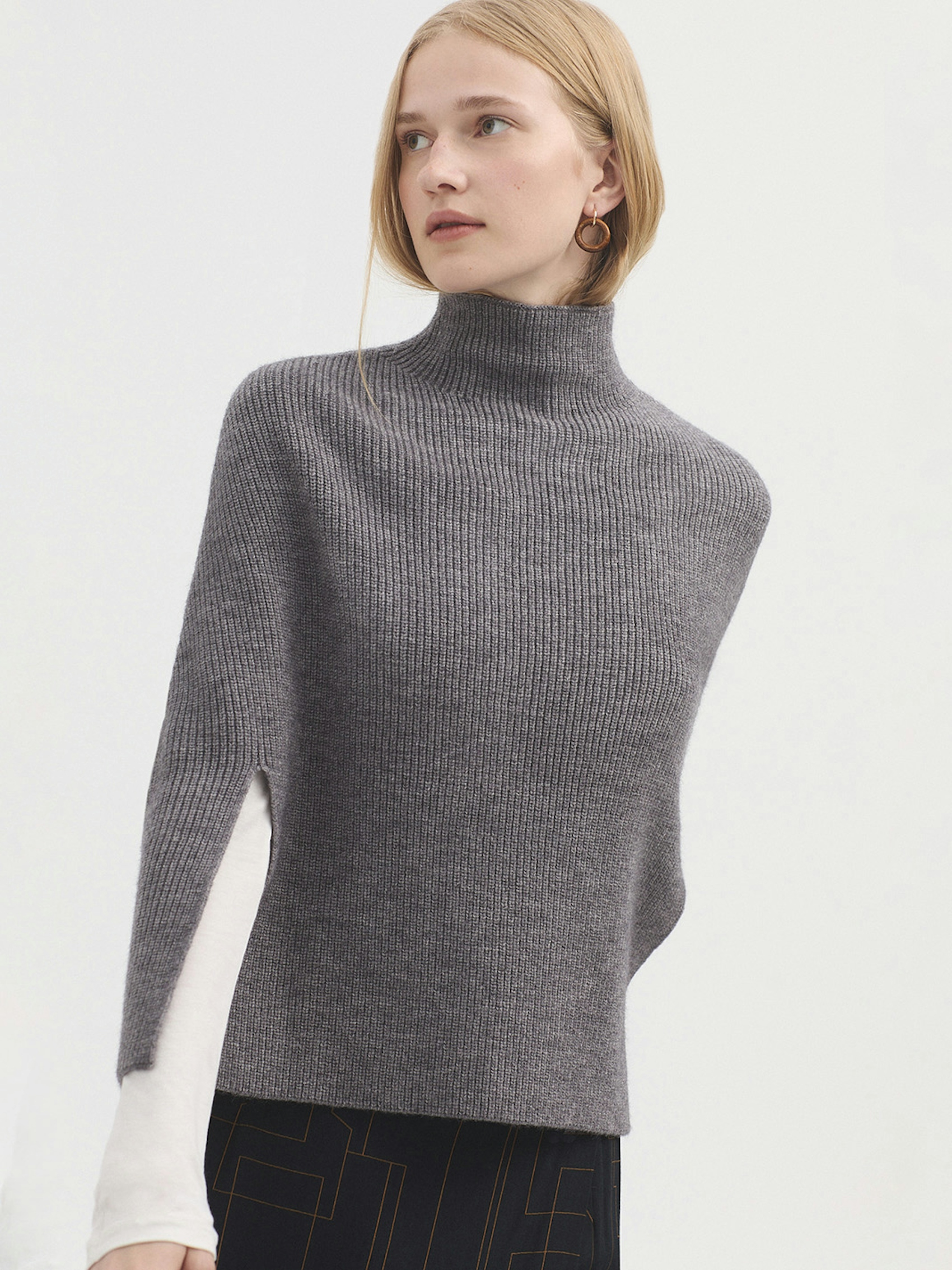 Roll neck cape with splits