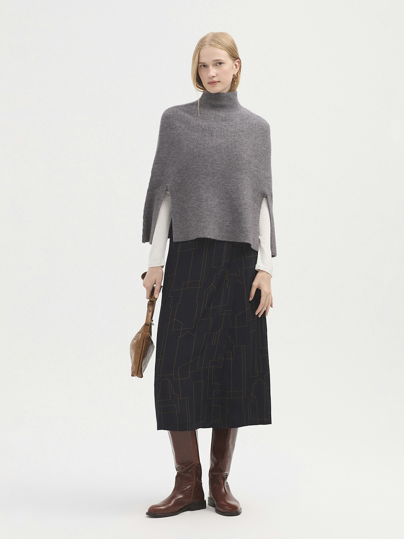 Roll neck cape with splits