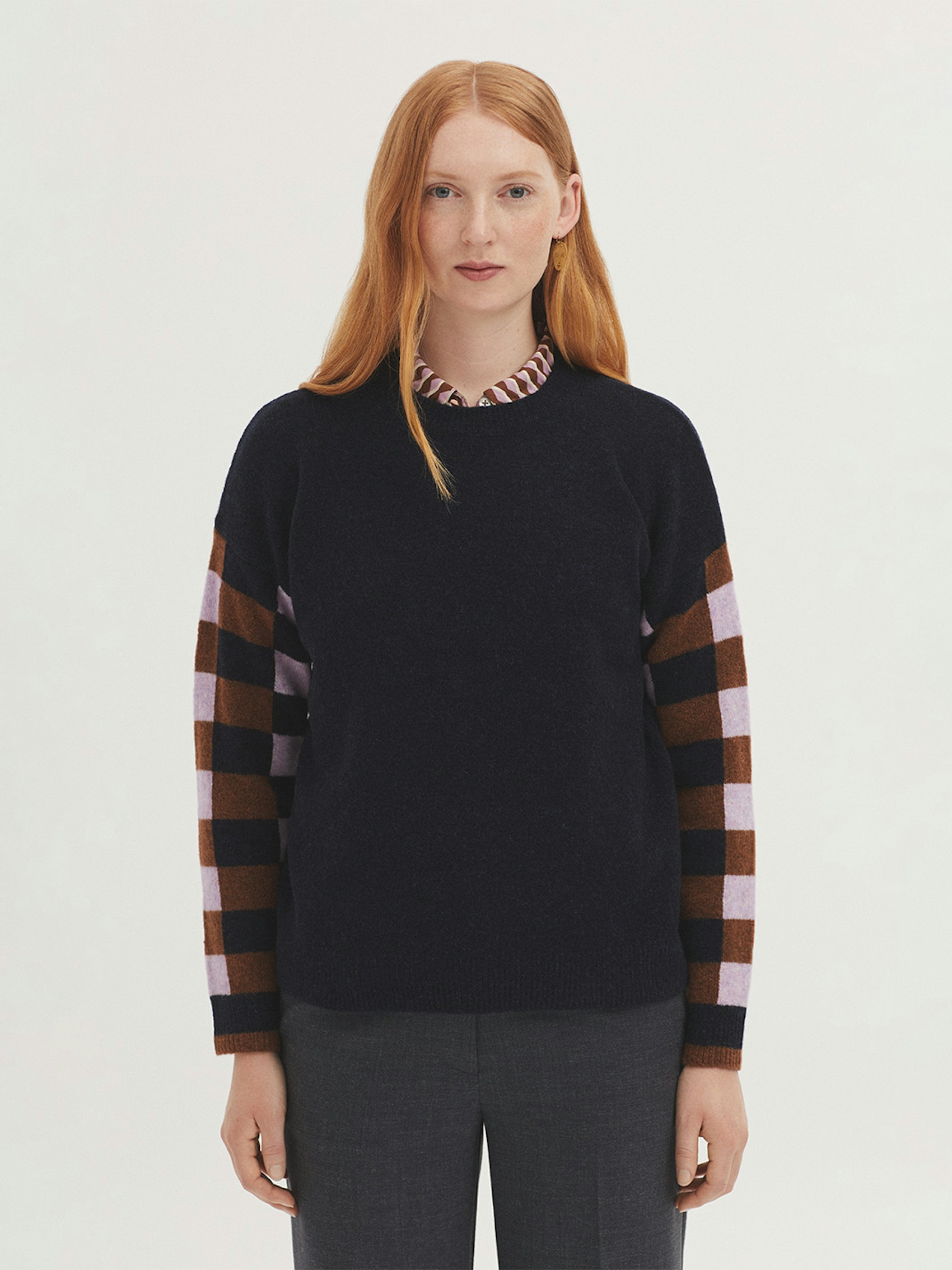 Lambswool jumper with checked sleeves