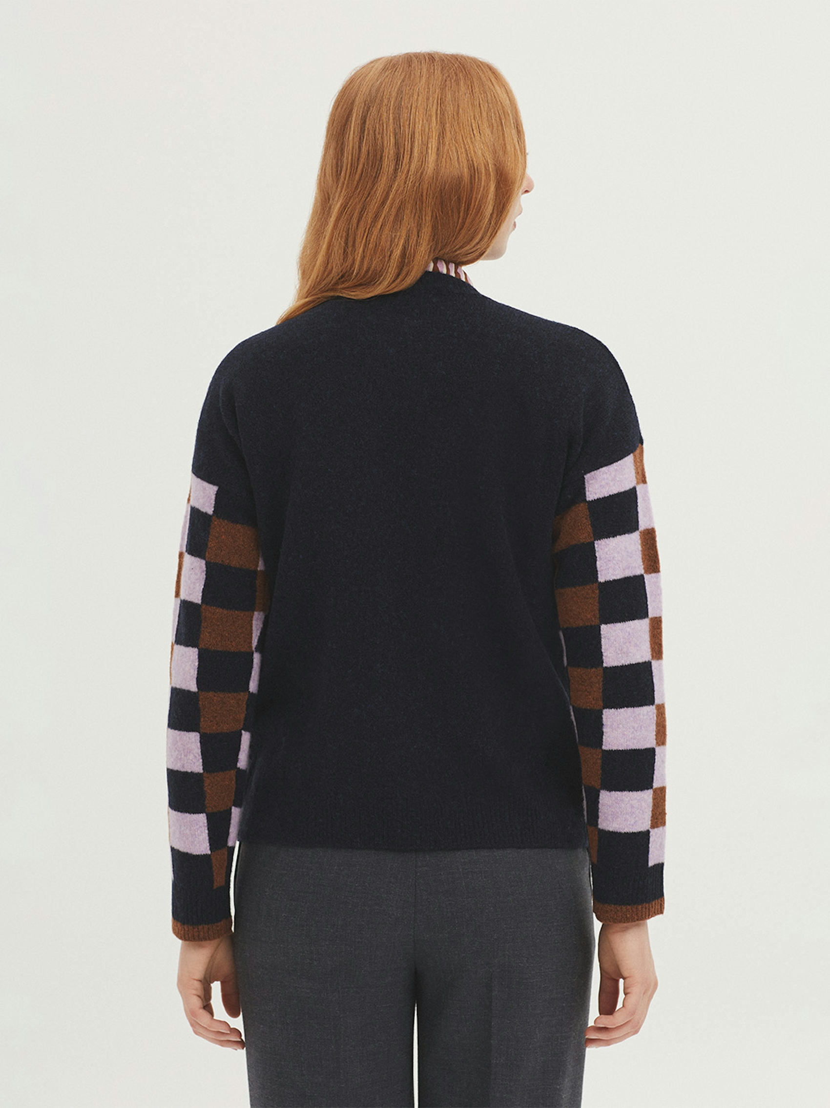 Lambswool jumper with checked sleeves