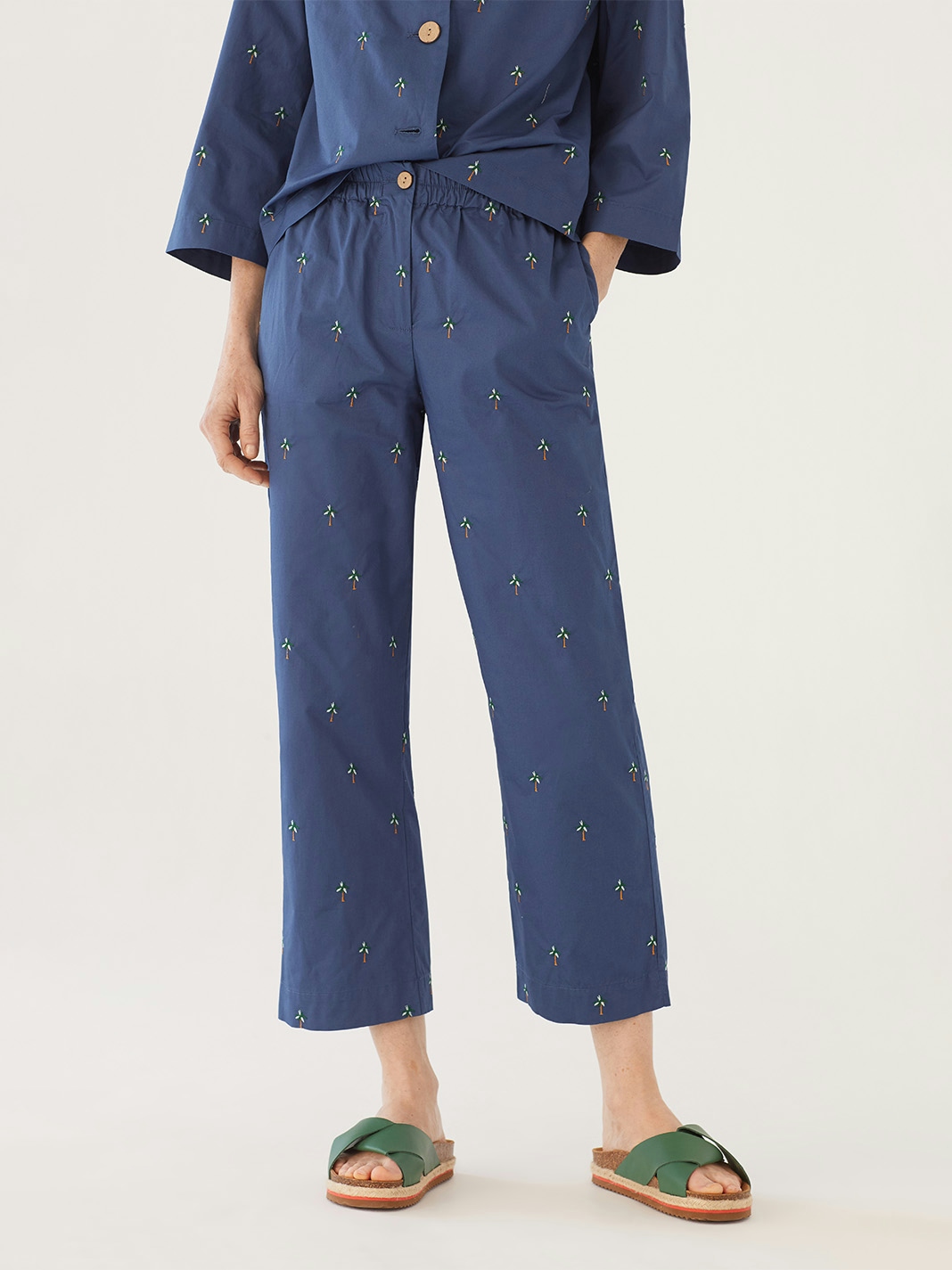 Palms embroidered trousers