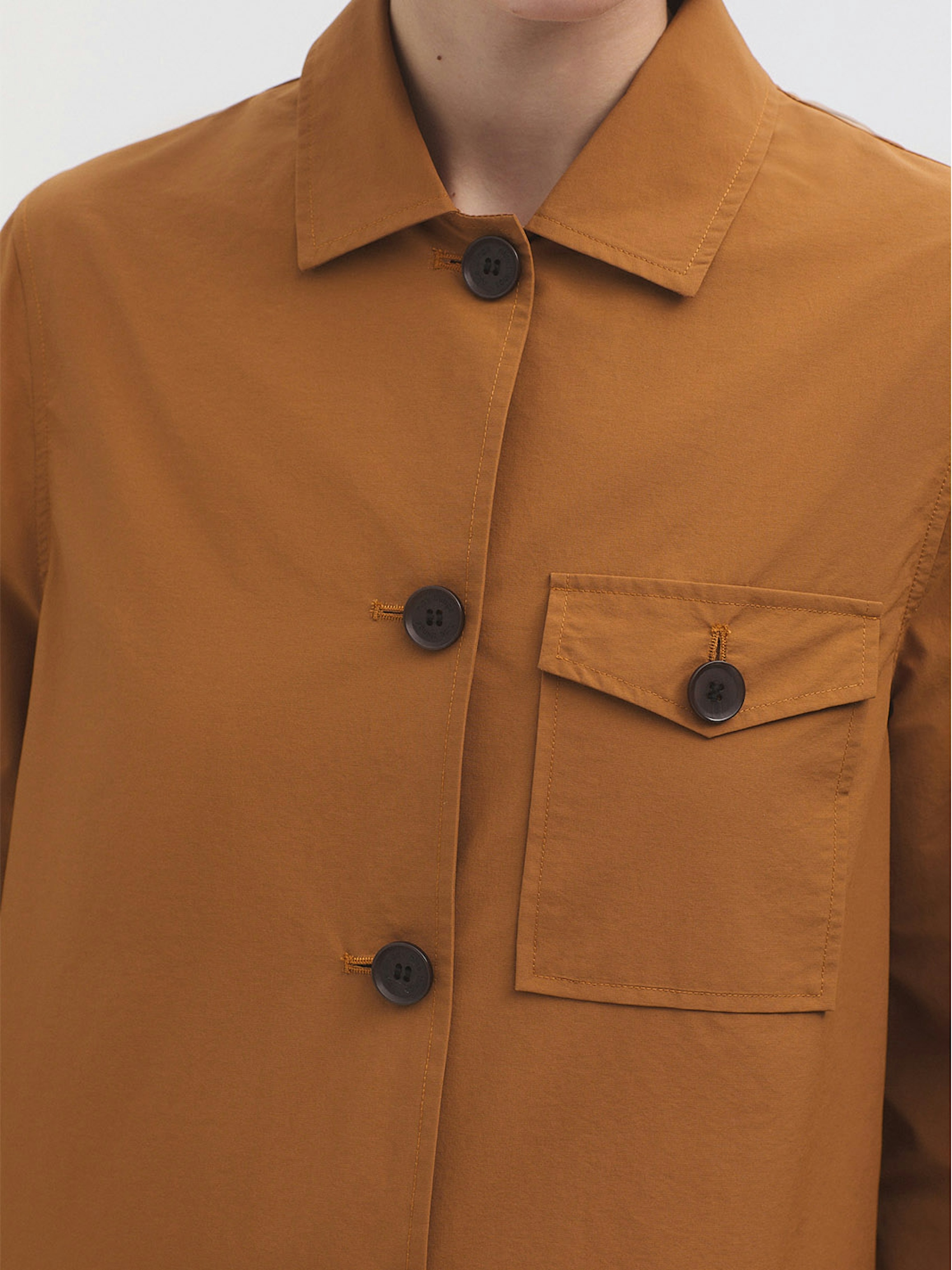 Back pocket trench coat