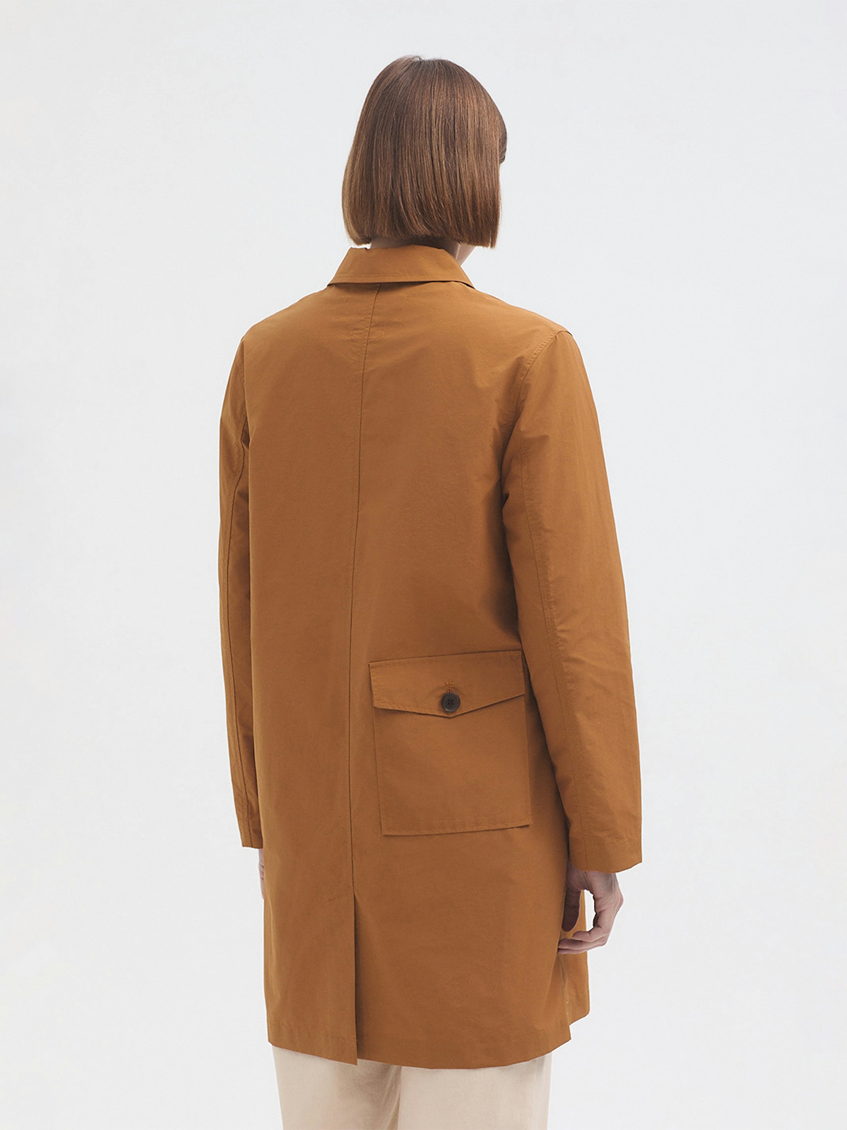 Back pocket trench coat