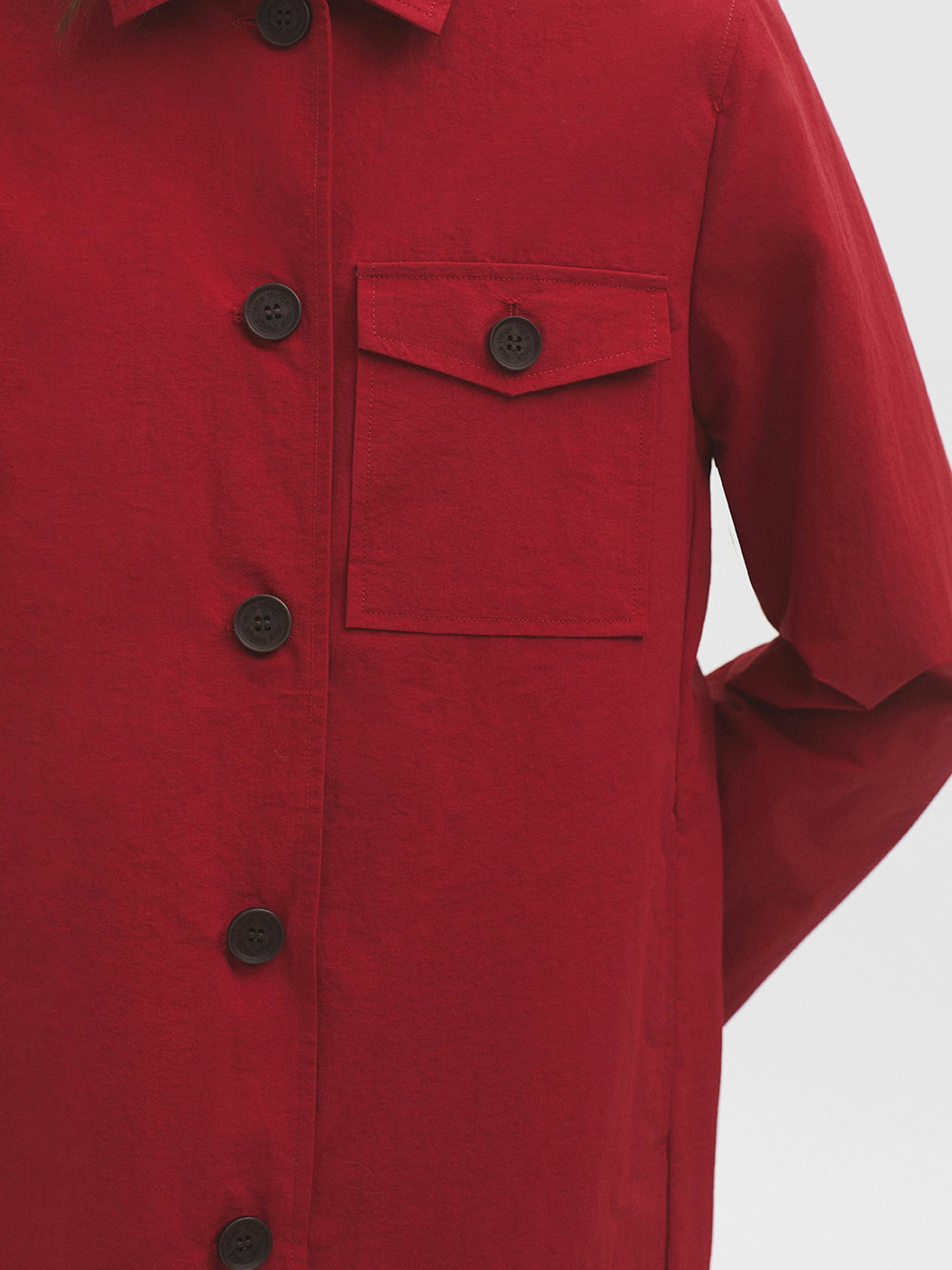 Back pocket trench coat
