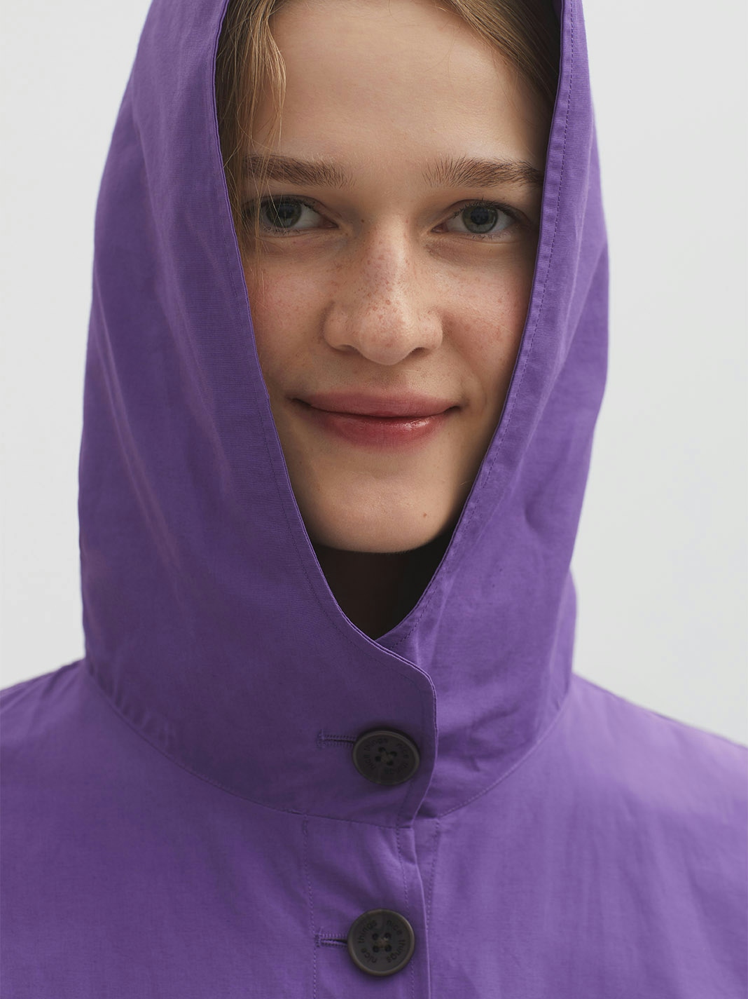 Trench imperméable capuche